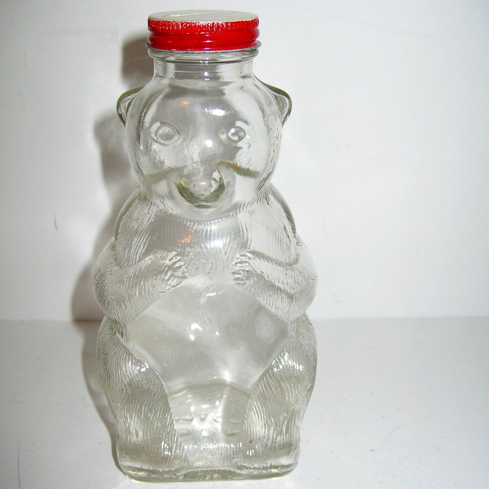 VINTAGE 7 1/4" SNOW CREST BEVERAGES SALEM MASS CLEAR GLASS BEAR BOTTLE BANK